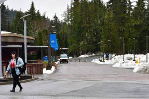 A student walks across the University of Alaska Southeast campus on Friday, Feb. 29, 2020. (Peter Segall | Juneau Empire)