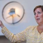 Angela Rodell, Executive Director of the Alaska Permanent Fund Corporation, speaks about the positive results of the fund this year at the APFC office in July 2018. (Michael Penn | Juneau Empire File)