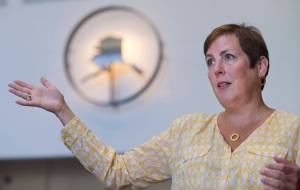 Angela Rodell, Executive Director of the Alaska Permanent Fund Corporation, speaks about the positive results of the fund this year at the APFC office in July 2018. (Michael Penn | Juneau Empire File)