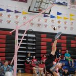 An athlete competes in the Alaskan high kick at the 2020 Traditional Games held Saturday and Sunday at Juneau-Douglas High School: Yadaa.at Kalé. The games attracted teams from throughout Alaska, international competitors and collegiate teams from Alaska Pacific University and Northern Arizona University. (Courtesy Photo | Lyndsey Brollini, courtesy of Sealaska Heritage Institute)