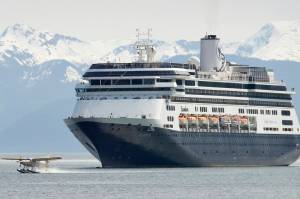 A Wings of Alaska floatplane lands as the Zaandam, right, and Ryndam cruise ships pull into the Juneaus downtown harbor 2009. (Michael Penn | Juneau Empire File)