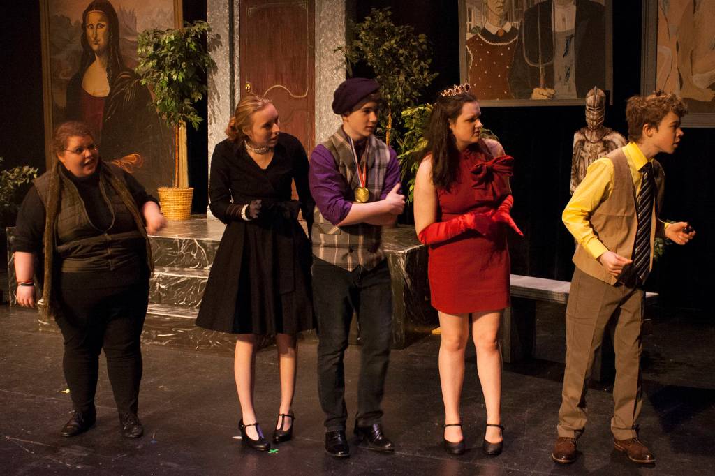 Mr. Green (Aria Moore), Professor Plum (Jager Hunt), Miss Scarlet (Amanda McDowell) and Colonel Mustard (Cahal Burnham) are surprised by something Wadsworth found just out of sight while rehearsing for JDHS production of Clue: On Stage. (Ben Hohenstatt | Juneau Empire)