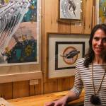 photos by Michael S. Lockett | Juneau Empire                                 Local artist Jacqueline Tingey poses with some of her works at the Devils Club Brewery during First Friday, March 6.