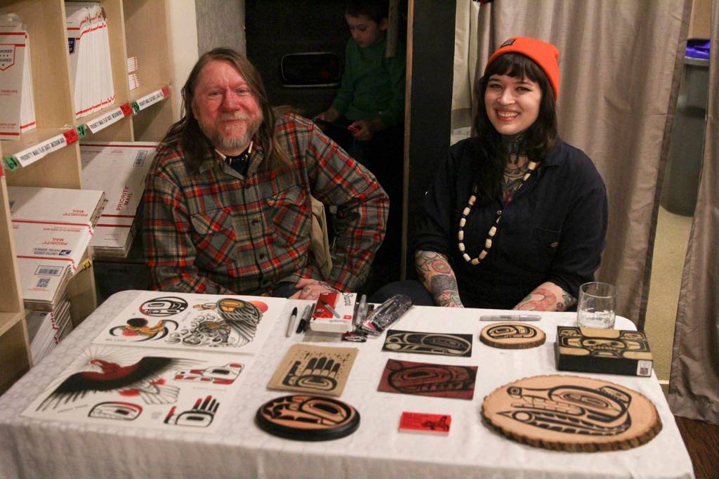 Dave Lang and Em Lang, proprieters of High Tide Tattoo, pose with some of their merchandise at Kindred Post.