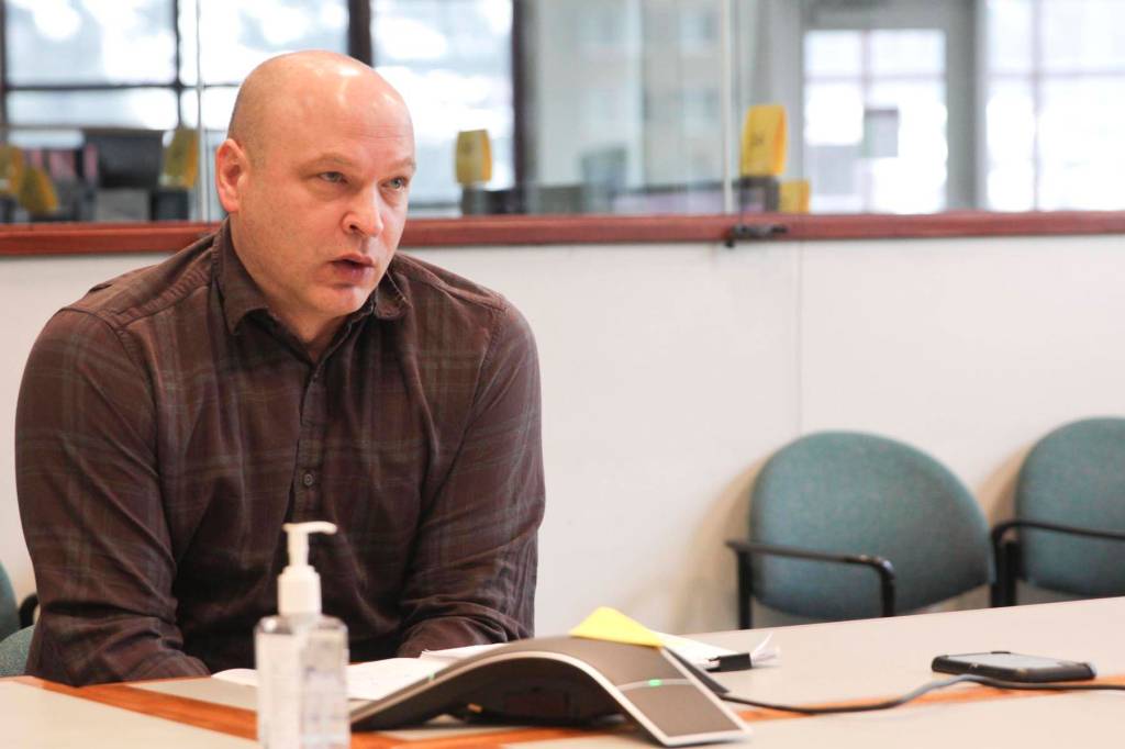 Scott Ciambor, chief housing officer for the City and Borough of Juneau, speaks during a meeting to discuss Juneaus plan for preventing the spread of the coronavirus among Juneau citizens experiencing homelessness on March 18, 2020. (Michael S. Lockett | Juneau Empire)