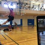 Matthew Quinto, a Thunder Mountain High School student, takes a shot at the one-foot high kick as members of Juneaus Native Youth Olympic team compete against Whitehorses Team Yukon in a traditional games competition over livestreaming video at the University of Alaska Southeast rec center on March 17, 2020. (Michael S. Lockett | Juneau Empire)
