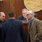 Courtesy photos | Brian Hild, House Majority Digital Media Specialist                                Lawmakers on the floor of the House talk during a vote on the supplemental budget on Wednesday.