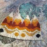 These earrings, the Desert Janes, are inspired by a friend that climbs in the desert often. Ruby Rouser created them last September. (Courtesy photo | Jessie Herman-Haywood)