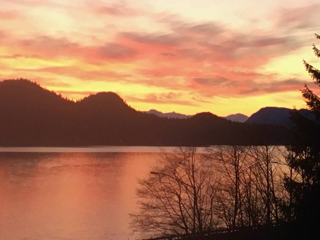 A sunset seen from Mile 2 paints the sky on Tuesday, March 31. (Courtesy Photo | Denise Carroll)