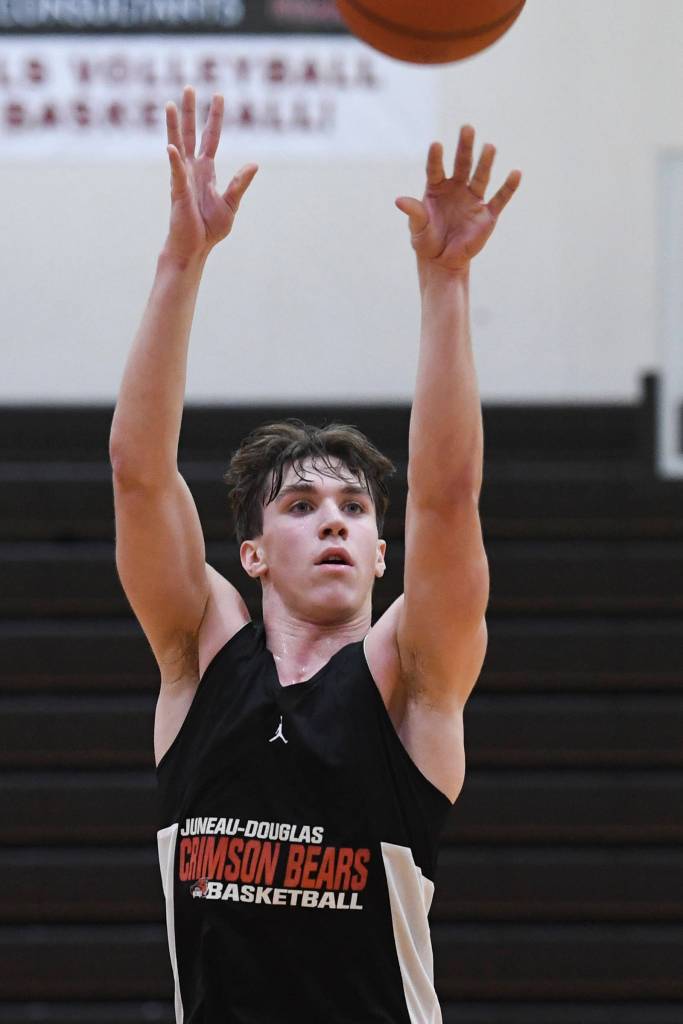 Cooper Kriegmont works on his jump shot during boys varsity basketball practice at Juneau-Douglas High School: Yadaa.at Kalé on Dec. 10, 2019. Kriegmont was one of three Juneau basketball players to earn all-state honors. (Michael Penn | Juneau Empire File)