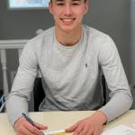 Bryson Echiverri has committed to playing college basketball at Spokane Community College.