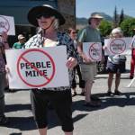 Judy Cavanaugh stands with others at a rally against the Pebble Mine in front of Sen. Lisa Murkowski���s Juneau office on Tuesday, June 25, 2019. (Michael Penn | Juneau Empire File)