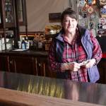 As the state government allows bars to reopen beginning Friday at 25% capacity, safety concerns, unclear guidelines and widespread maintenance will prevent many of Juneaus bars, like Imperial Billiards and Bar, pictured here with bar manager Shelly Hurt, from opening up, May 7, 2020. (Michael S. Lockett | Juneau Empire)