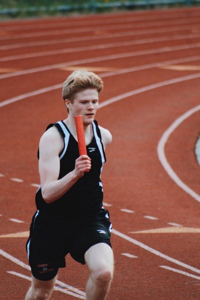 Courtesy Photo | For JDHS Track & Field                                 Ian DAmore grasps the baton while running a relay.
