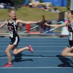 Sosan Monsef hands off the baton to teammate Sadie Tuckwood during the 2018 Alaska Track and Field State Championships. (Courtesy Photo | For JDHS Track & Field)