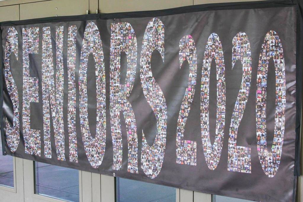 The senior class of 2020 graduates with much less pomp and circumstance as the coronavirus keeps gatherings truncated and social interaction at arms length, May 22, 2020. (Michael S. Lockett | Juneau Empire)