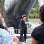 Christianne Carrillo and Jennifer Gross listen while Gloria Merry talks to begin the I Cant Breathe vigil held Saturday, May 30 at Mayor Bill Overstreet Park. Most attendees wore masks, many brought protest signs and the event was peaceful. (Ben Hohenstatt | Juneau Empire)