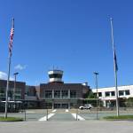 City and Borough of Juneau Assembly will decide Wednesday evening whether to extend a mandate that requires out-of-state visitors, such as the ones that come in through Juneau International Airport, to self-quarantine for two weeks. (Peter Segall | Juneau Empire)