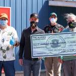 Members of Top Hat Cannabis pose with members of the Southeast Alaska Food Bank as they make a $10,000 donation to the food bank on Friday, May 29, 2020. (Courtesy photo | John Nemeth)