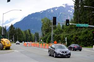 Construction takes place at Mendenhall Loop Road and Stephen Richards Memorial Drive on Monday, June 9, 2020. Work on the roundabouts is expected to be completed by September. (Peter Segall | Juneau Empire)