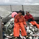 Triston Chaney and his brother sit aboard their grandpas gill-netter in Bristol Bay. (Courtesy Photo | Triston Chaney)