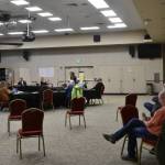 City and Borough of Juneau Assembly Member Loren Jones and Mayor Beth Weldon listen from the wings to a meeting of the Juneau Economic Stabilization Task Force at Elizabeth Peratrovich Hall on Friday, June 26, 2020. (Peter Segall | Juneau Empire)