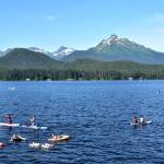 Juneauites enjoy the warm and sunny weather at Auke Lake on Thursday, July 2, 2020. Warm weather over the holiday weekend raised concerns about both COVID-19 spreading at gatherings, and fire danger from fireworks. (Peter Segall | Juneau Empire)