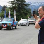 Jude Winchell, 3, takes in a parade from ontop of Cory Winchells shoulders, Saturday, July 4, 2020. (Ben Hohenstatt | Juneau Empire)