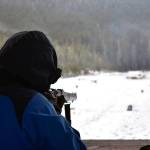Nolin Ainsworth sights down an Ishapore 2A1 rifle at the Hank Harmon Rifle Range, Dec. 1, 2019. The range will be closed Monday and Tuesday as the brush around the perimeter is cleared by the COVID-19 Conservation Corps. (Peter Segall | Juneau Empire)