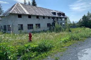 This undated photo shows a building that remains at the site of the Jesse Lee Home in Seward, Alaska, where the territorial flag, which later became the Alaska state flag, was first flown.The neglected site where the Alaska territorial flag was designed, sewn and first flown will be demolished despite last-minute efforts by Alaskans and a preservation group to save it. The Seward City Council voted Monday, July 13, 2020, to raze the Jesse Lee Home. (Trish Neal via AP, File)