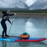 Kaitlyn Tolin, pictured, paddled with partner Amanda Painter from Juneau to Haines over three days in early July. They said they were inspired by friends who had made similar paddleboard trips. (Courtesy photo | Kaitlyn Tolin)