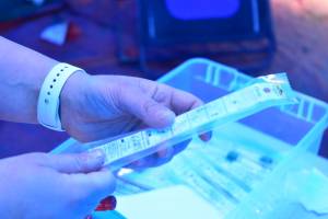 Capital City Fire/Rescue Firefighter paramedic Wendy Wallers holds a COVID-19 screening kit at the Hagevig Regional Fire Training Center on Monday, June 29, 2020. (Peter Segall | Juneau Empire File)