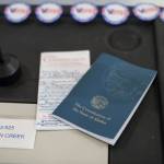 Copies of the U.S. Constitution as well as I voted stickers are available to voters during the Municipal Election at AEL&P on Tuesday, Oct. 2, 2018. Lt. Gov. Kevin Meyer announced the states August 2020 primary would be conducted in the traditional manner and pointed to the states already available alternative voting options in response to COVID-19 health concerns. (Michael Penn | Juneau Empire File)