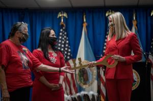 Tribal leaders including Myrna Warrington, far left, of Menominee Indian Tribe of Wisconsin, gave Ivanka Trump a ceremonial key when she spoke at the grand opening of the first Missing and Murdered Native American Cold Case Office. American Indians and Alaska Native are 2.5 times as likely to experience violent crimes. This is one of seven offices that is being established under Executive Order 13898 by President Donald J. Trump. (Richard Tsong-Taatarii/Star Tribune)