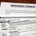 This photo shows absentee ballot paperwork sent to an Alaskan voter in July 2020. (Ben Hohenstatt | Juneau Empire)