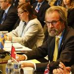 Konrad Steffen, wears glasses and a yellow tie, at the White House in 2016, where he represented Switzerland at the first Arctic Ministerial Conference. (Courtesy Photo / Swiss Federal Institute for Forest, Snow and Landscape)