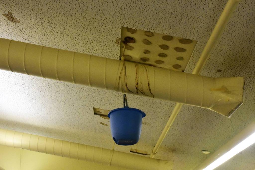 A bucket hangs from the ceiling in Christi Martzs Kindergarten classroom at Riverbend Elementary School on Friday, Aug. 21, 2020. (Peter Segall / Juneau Empire)