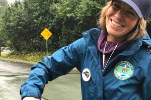 Alaska Department of Fish and Game wildlife educator Abby McAllister applies a sticker letting a resident know their trash can isnt bear-resistant as part of a larger effort to reduce rising numbers of bears in Juneau. (Courtesy photo / Laurie Craig)