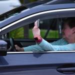 Peter Segall / Juneau Empire                                 A spectator keeps her hand on the horn, ready to honk her approval of the performance onstage at the 2020 GLITZ Drive-in Drag Show on Saturday, Aug. 29, 2020.