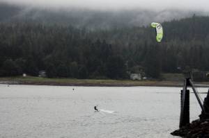 A kiteboarder practices their hobby in spite of dreary weather as Juneaus third wettest summer on record comes to a damp end, Sept. 3, 2020. (Ben Hohenstatt / Juneau Empire)