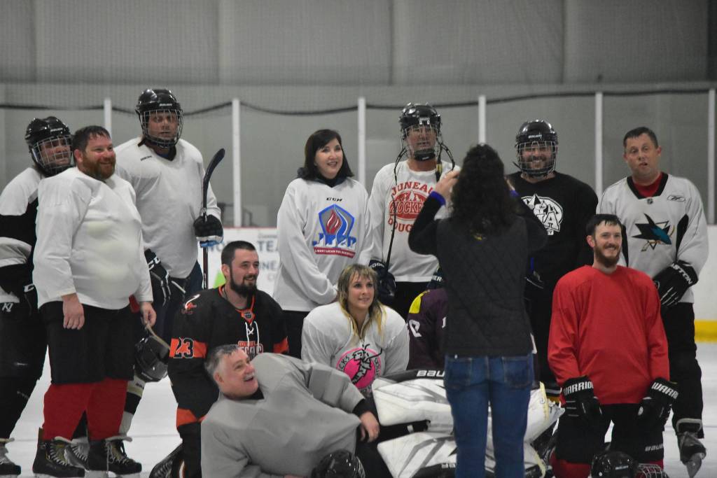 Libertarian presidential candidate Jo Jorgensen poses with Juneau hockey players during her visit to Juneau on Tuesday, Sept. 8, 2020. (Peter Segall / Juneau Empire)