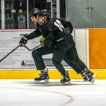 Coach Mike Bovitz works with a player in the 14-and-under group. Bovitz will be preparing a team for when JDIA hosts the 14U, Division A state tournament next spring.