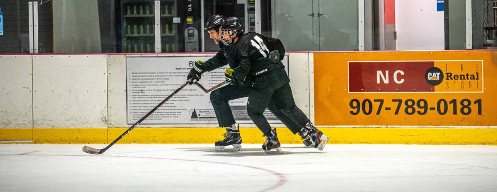 Coach Mike Bovitz works with a player in the 14-and-under group. Bovitz will be preparing a team for when JDIA hosts the 14U, Division A state tournament next spring.