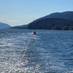 A Coast Guard Station Juneau 45-foot Response Boat-Medium crew tows a disabled 22-foot sailing vessel near Marmion Island, Sept. 13, 2020.(Courtesy Photo/Petty Officer 2nd Class Anthony DeLorenzo)