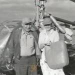 Nancy Livingston Stratford stands with one of the pilots she was training to fly in 1957. Stratford, one of the first women in the world to fly helicopters commercially, would later move to Juneau where she and her husband started one of the first local helicopter companies. (Courtesy Photo / Cori Scherer)