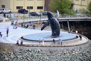 Spectators gathered at Mayor Bill Overstreet Park to watch C-17 Globemaster III cargo planes from Joint Base Elmendorf-Richardson perform a flyby over Juneau on May 15, 2020. Monday, Sept. 21, the park will be the site of a Veterans for Peace-sponsored event commemorating International Day of Pease. Peter Segall / Juneau Empire File)