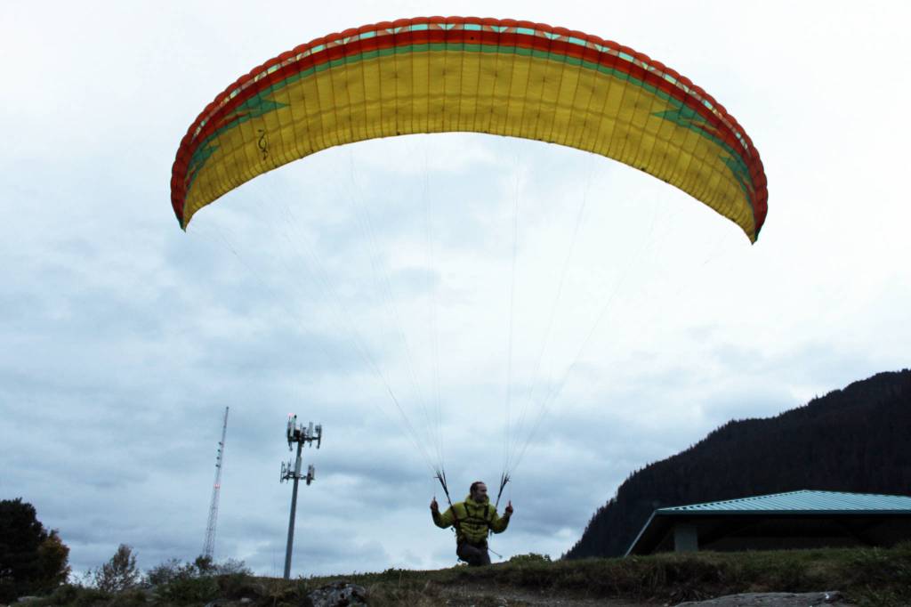 Paragliders chutes added some vibrant colors to otherwise gray skies, Sept. 22, 2020. (Ben Hohenstatt / Juneau Empire)