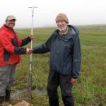 Rich Kleinleder and David Klein pose on St. Matthew Island in August, 2012, after they pulled a core of sediment from the island. (Courtesy Photo / Ned Rozell)