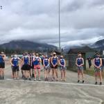 Mask-clad Thunder Mountain High School cross country runners stand together. Courtesy Photo / Sandi Pahlke