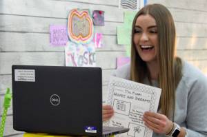 Second-grade teacher Katie Koski reacts to the news that a student lost a tooth and a was visited by the Tooth Fairy, Friday, Sept. 4, 2020. (Ben Hohenstatt / Juneau Empire)